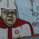 Part of a mural in Portland, Maine, showing Gov. Paul LePage dressed in Ku Klux Klan garb
BDN Maine Screenshot
